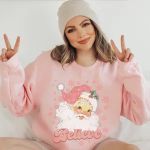 Women's Christmas Pink Santa Believe Unisex-Size Crewneck Sweatshirt Retro Vintage Santa Clause in Ash, Sand, White or Navy